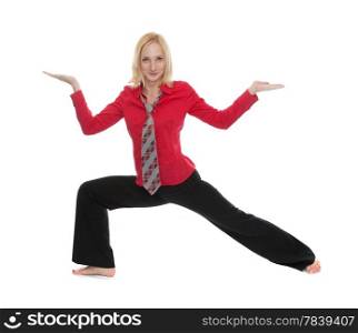 Practicing Yoga. Young businesswoman isolated on white background