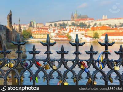 Prague Castle and Little Quarter, Czech Republic. Decorative fence with the locks of lovers in the foreground. The focus in the foreground.