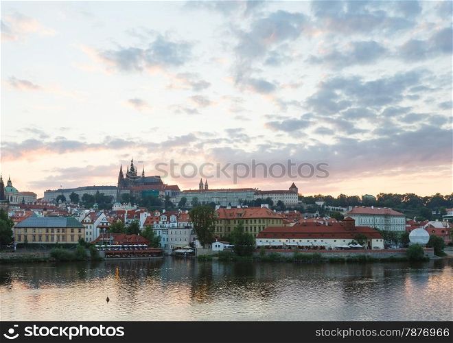 Prague City on Vltava river. Sunset view (Czech Republic).