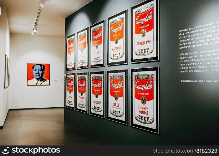 Prague, Czech - March 2023. Andy Warhol C&bells soup exhibition in Central Gallery. Famous colorful installation. Legend artist, painting, collection. High quality photo. Prague, Czech - March 2023. Andy Warhol C&bells soup exhibition in Gallery.