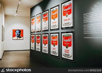 Prague, Czech - March 2023. Andy Warhol C&bells soup exhibition in Central Gallery. Famous colorful installation. Legend artist, painting, collection. High quality photo. Prague, Czech - March 2023. Andy Warhol C&bells soup exhibition in Gallery.