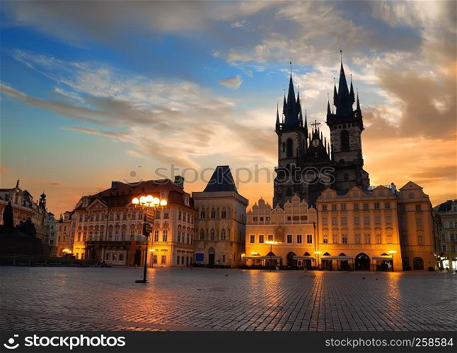 Prague Old Town square illuminated at sunrise