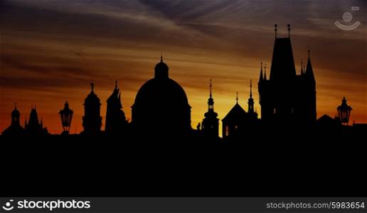 Prague silhouettes from Charles Bridge before dawn, Prague, Czech Republic