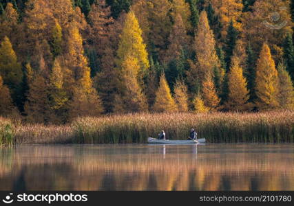 Prairie colors in fall yellow orange trees canoe calm