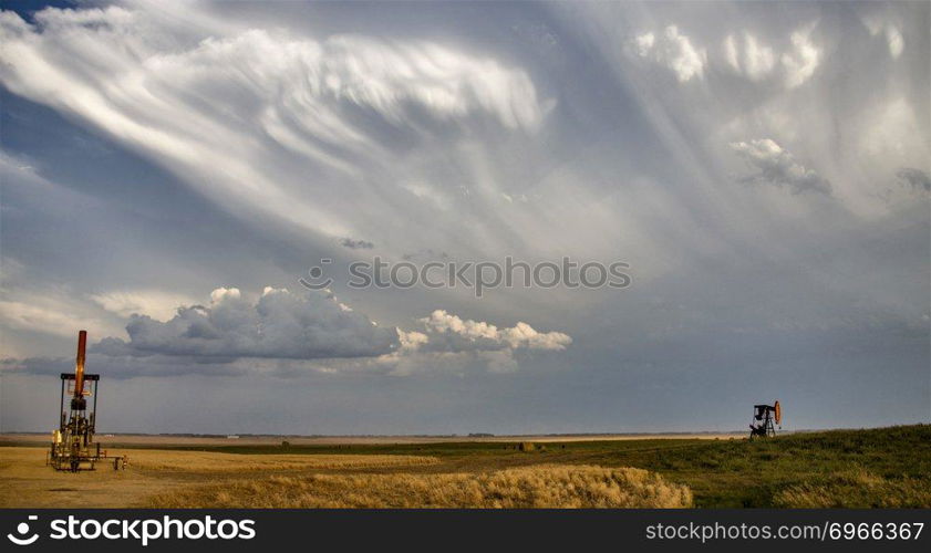 Prairie Storm Clouds Saskatchewan oil pump jack