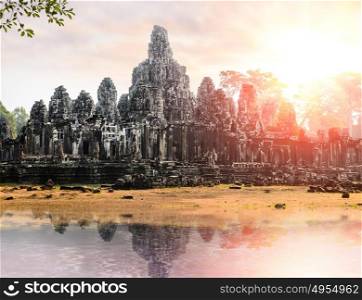 Prasat Bayon, part of Angkor Khmer temple complex, popular among tourists ancient landmark and place of worship in Southeast Asia. Siem Reap, Cambodia.. The Bayon temple
