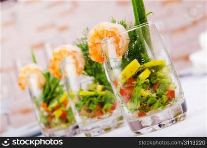 Prawn salad served in the glasses