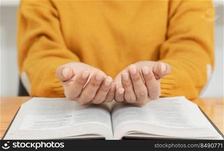 Pray and religion concept, Female christian reading bible and praying for spirituality and faith.