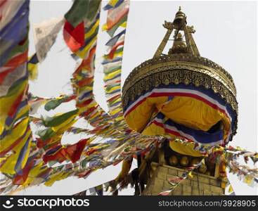 Prayer flags on Boudhanath Buddist Stupa in Kathmandu in Nepal. Boudhanath is a UNESCO World Heritage Site.
