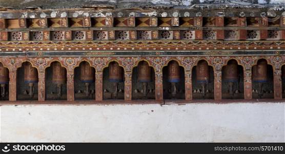 Prayer wheels at the temple in Wangdue Phodrang Dzong, Wangdue Phodrang, Bhutan
