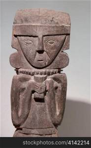 Pre-Columbian Wooden statue in Museo de Arte Precolombino, Cuzco, Peru