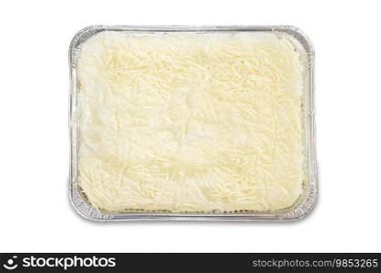 Pre-cooked cold lasagne foil tray. Isolated over white