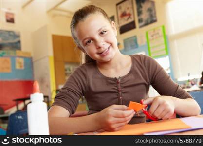 Pre teen girl in art and craft class