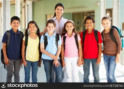 Pre teen schoolchildren with teacher