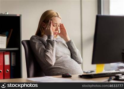 pregnancy, business, stress, gestosis and people concept - pregnant businesswoman feeling sick or suffering from headache at office work