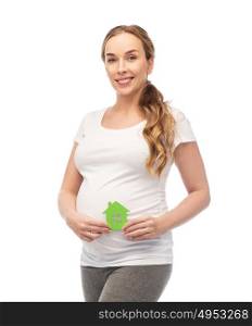 pregnancy, ecology, people and housing concept - happy pregnant woman with green house over white background. happy pregnant woman with green house