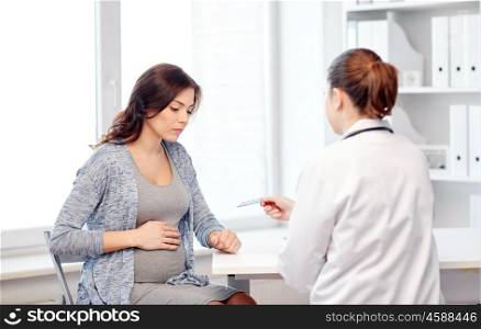 pregnancy, gynecology, medicine, health care and people concept - gynecologist doctor and pregnant woman meeting at hospital