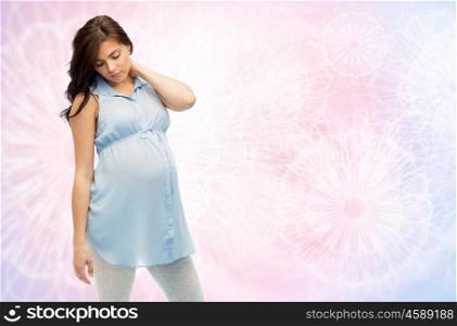 pregnancy, health, people and expectation concept - pregnant woman in bed touching her back and suffering from neckache over rose quartz and serenity pattern background