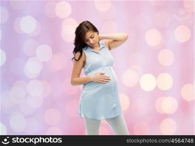 pregnancy, health, people and expectation concept - pregnant woman touching her neck and suffering from ache over rose quartz and serenity holidays lights background