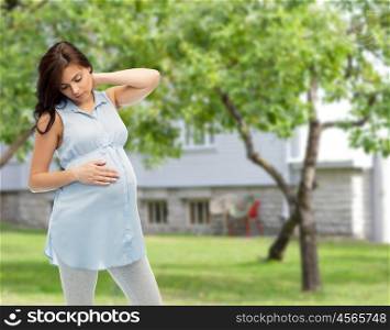 pregnancy, health, people and expectation concept - pregnant woman touching her neck and suffering from ache over summer garden and house background