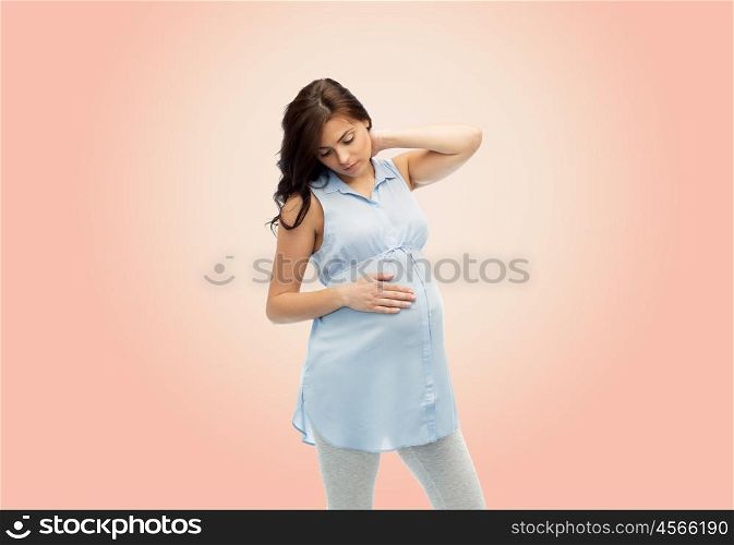 pregnancy, health, people and expectation concept - pregnant woman touching her neck and suffering from ache over beige background