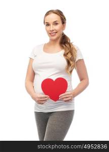 pregnancy, love, people and expectation concept - happy pregnant woman with red heart. happy pregnant woman with red heart