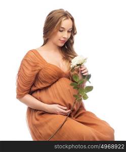 pregnancy, motherhood, holidays, people and expectation concept - happy pregnant woman with rose flower over white background. happy pregnant woman with white rose flower