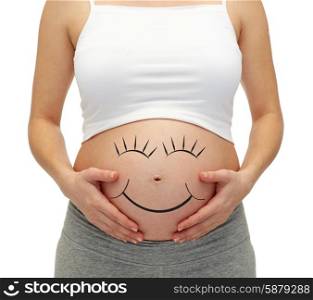 pregnancy, motherhood, people and expectation concept - close up of pregnant woman touching her bare tummy
