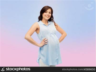 pregnancy, motherhood, people and expectation concept - happy pregnant woman touching her big belly over rose quartz and serenity gradient background