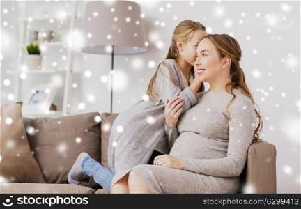 pregnancy, people and family concept - happy girl talking to pregnant woman and whispering secret to her ear at home over snow. happy pregnant woman and girl gossiping at home