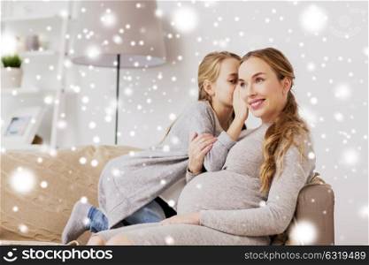 pregnancy, people and family concept - happy girl talking to pregnant woman and whispering secret to her ear at home over snow. happy pregnant woman and girl gossiping at home