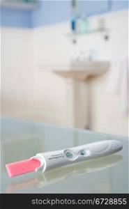 Pregnancy testing kit in bathroom