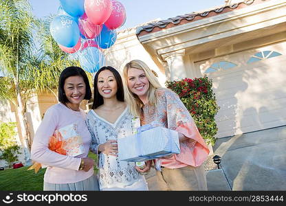 Pregnant Asian Woman with Mother and Friend at a Baby Shower