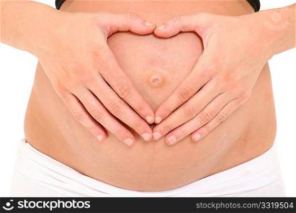 Pregnant belly with mom making heart shape with her hands on her belly over white.