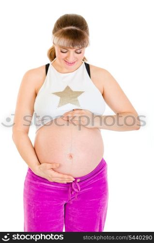 Pregnant female in sportswear holding her belly isolated on white&#xA;