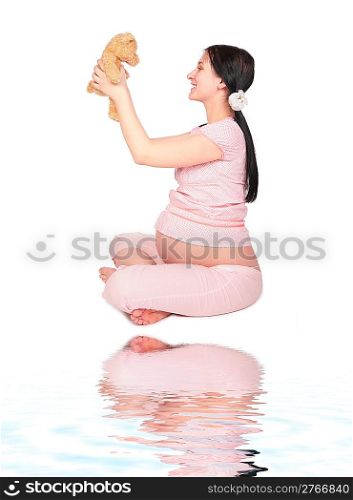 Pregnant girl with toy