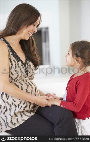 Pregnant Mother With Daughter At Home