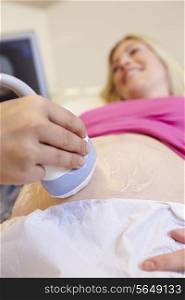 Pregnant Woman And Having 4D Ultrasound Scan