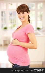 Pregnant woman at home