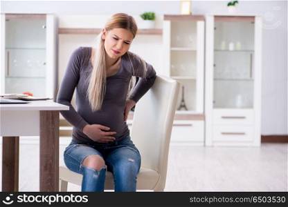 Pregnant woman at home getting ready for childbirth