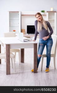 Pregnant woman at home getting ready for childbirth