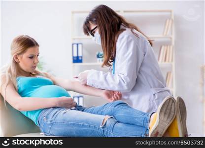 Pregnant woman at regular pregnancy check-up