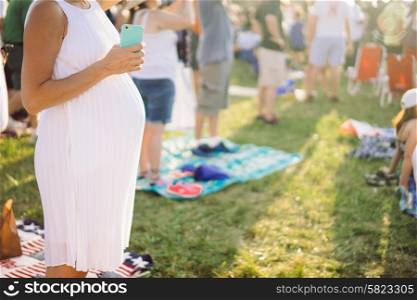 Pregnant woman at the picnic