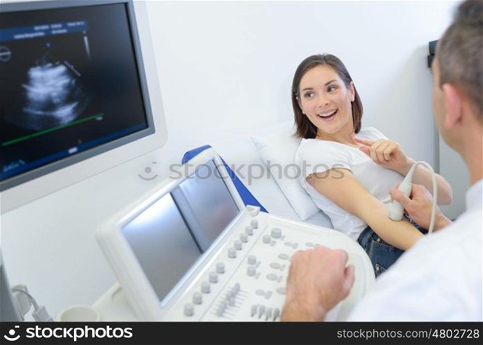 pregnant woman checking her echography