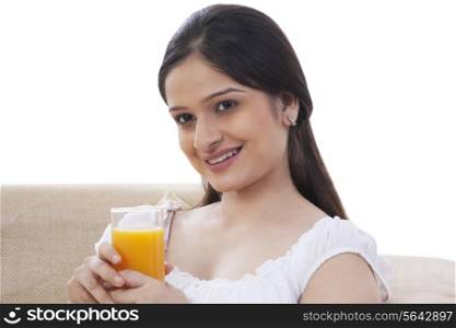 Pregnant woman drinking juice