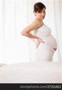 pregnant woman having backache