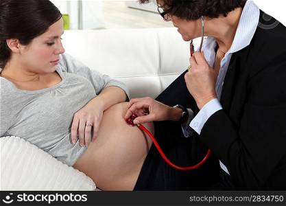 Pregnant woman having check-up