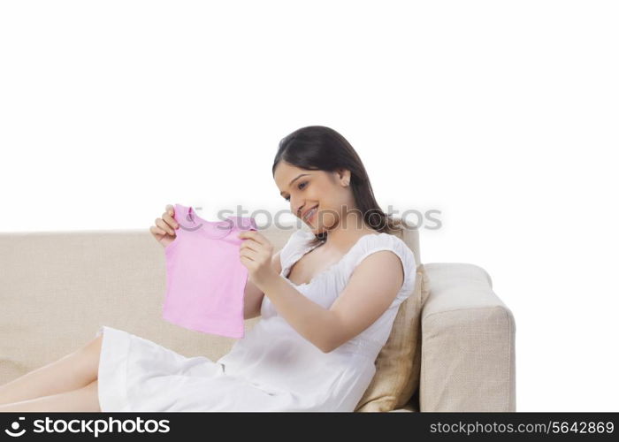 Pregnant woman holding a baby t-shirt