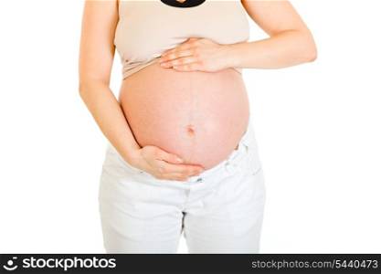 Pregnant woman holding her belly isolated on white background. Close-up.&#xA;