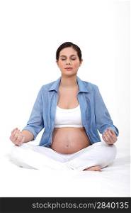Pregnant woman in a yoga position